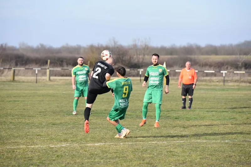 Competitive amateur football match on a clear day in Vásárosnamény, Hungary. (stock photo via Pexels)