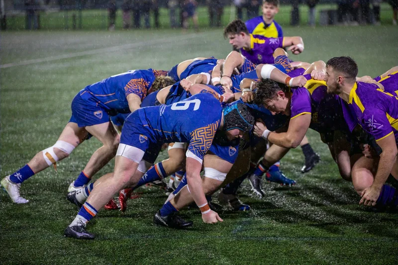 A dynamic rugby scrummage during a match in Manchester, England. (stock photo via Pexels)