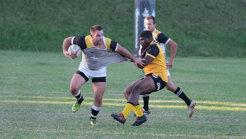Intense rugby match in South Africa showcasing teamwork and competition on a sunny day. (stock photo via Pexels)